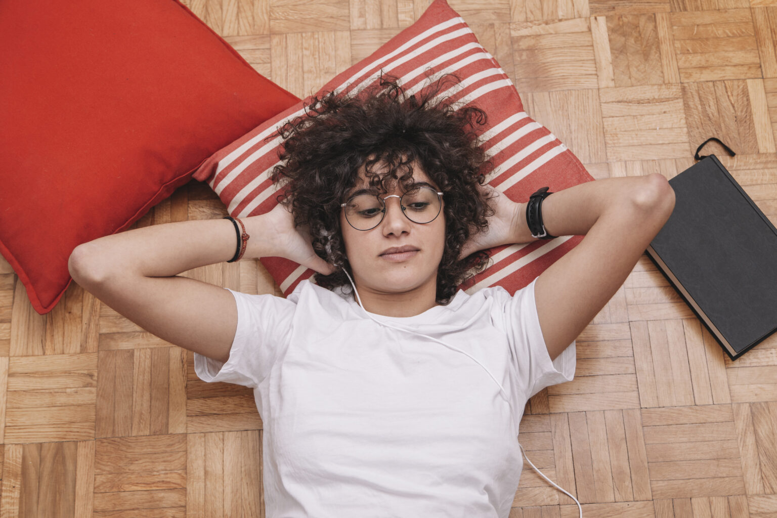 Teenager listening to music and relaxing